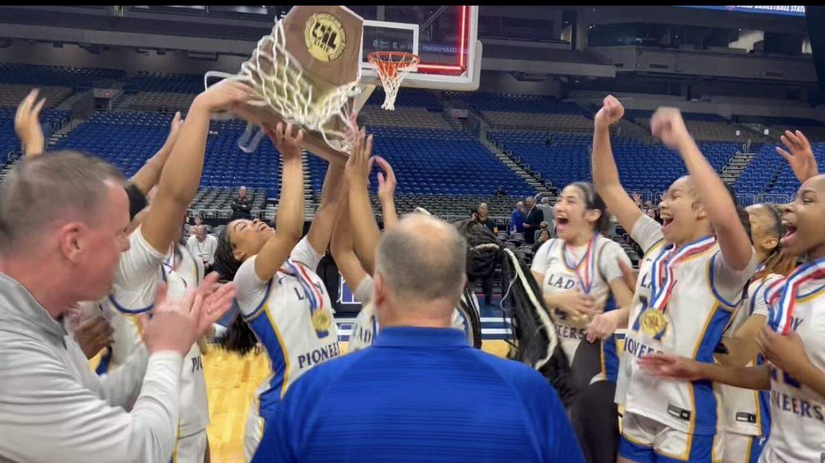 Boswell girls basketball players celebrate with the Class 6A Division II state championship after a victory over Fort Bend Hightower at the Alamodome in San Antonio on Saturday, March 1, 2025.