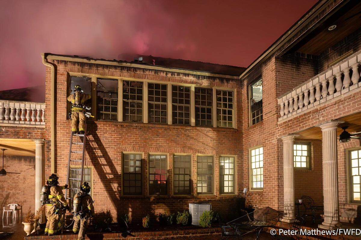 Fort Worth firefighters battled a fire at a large house in the Crestline neighborhood, near the River Crest Country Club, early Wednesday, Feb. 5, 2025.