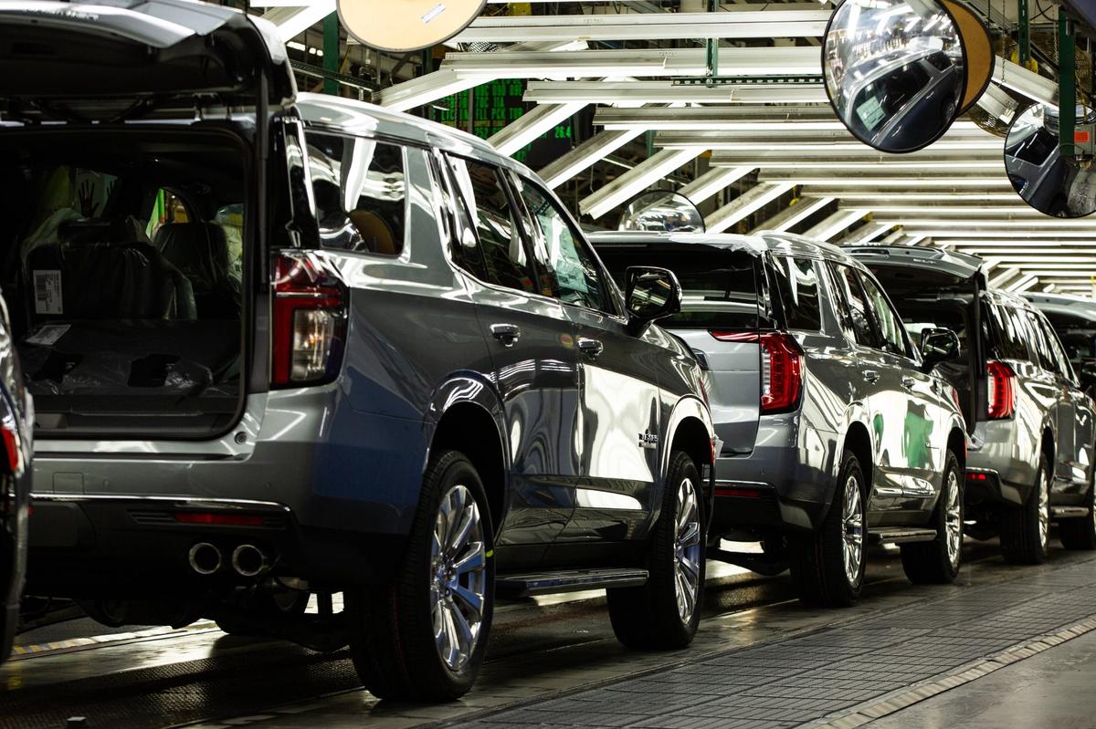 The assembly line at the General Motors assembly plant in Arlington produces luxury SUVs on Friday, July 26.