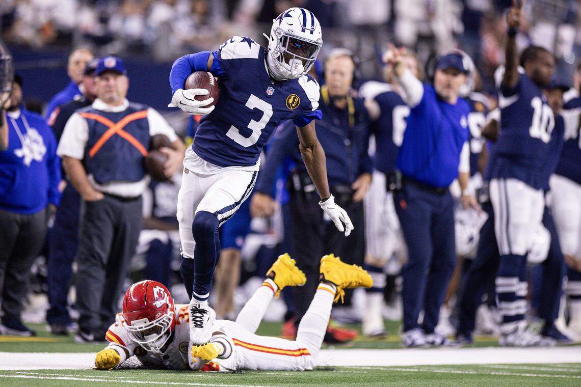 Cowboys wide receiver George Pickens (3) leaps over a defender in the second half of an NFL game between the Dallas Cowboys and the Kansas City Chiefs at AT&T Stadium in Arlington on Thursday, Nov. 27, 2025.
