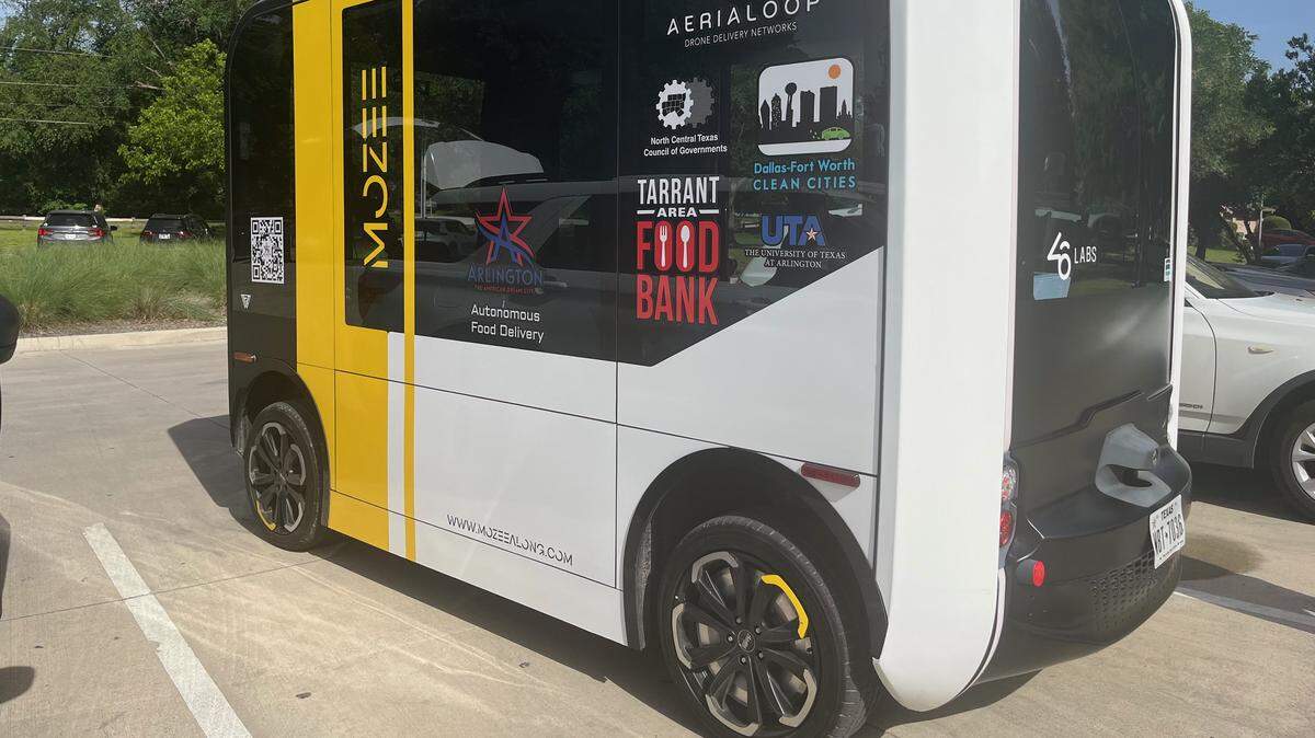 A self-driven ground vehicle is being used in a pilot program to evaluate the use of no-emission or low-emission uncrewed aircraft and ground robots to deliver essential food items to individuals who are underserved. A demonstration of the project was held Wednesday, May 14, in Arlington.
