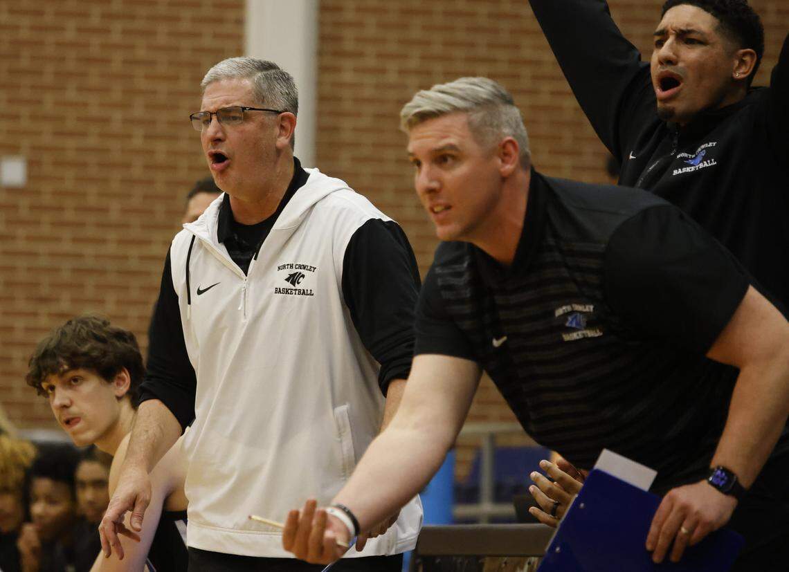 North Crowley head coach Tommy Brakel and other coaches react to play during the first half of a UIL boys basketball game between North Crowley and Mansfield at Mansfield High School in Mansfield, Texas, Tuesday Jan. 20, 2026