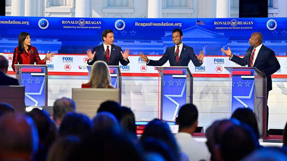 (From left) Former South Carolina Gov. Nikki Haley, Florida Gov. Ron DeSantis, businessman Vivek Ramaswamy and South Carolina Sen. Tim Scott speak during the FOX Business Republican presidential primary debate at the Ronald Reagan Presidential Library and Museum.