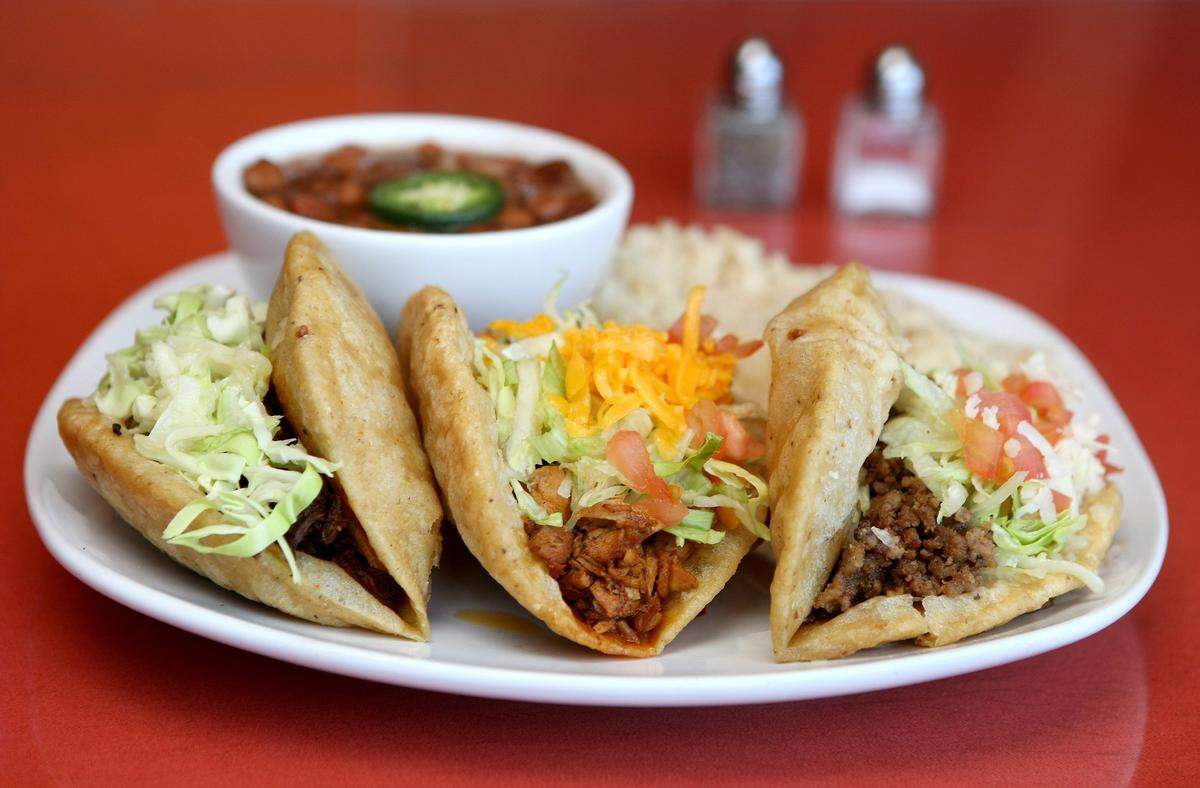 The much-missed puffy tacos from the original Caro’s recipe, shown here at Dos Juans Puffy Tacos, a short-lived successor on Bluebonnet Circle.