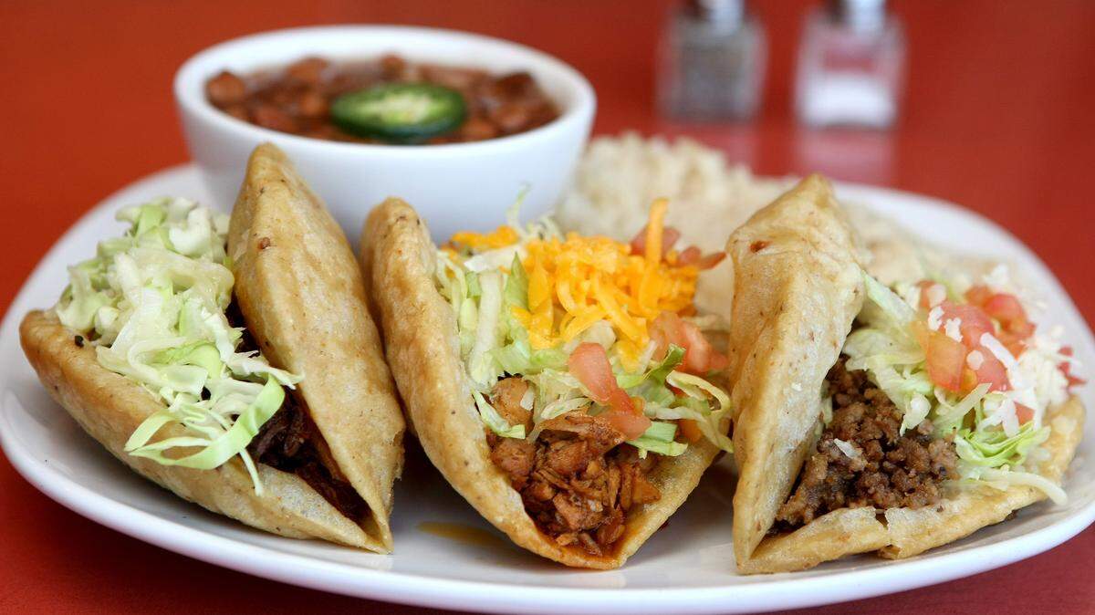 Puffy tacos from Dos Juans Puffy Tacos & Cerveza is photographed in Fort Worth, TX on Thursday, July 21, 2011. (Star-Telegram/Khampha Bouaphanh)