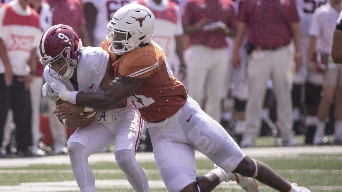 Alabama quarterback Bryce Young (9) was under considerable pressure all day but pulled it out as No. 1 Alabama defeated Texas 20-19 on a last-second field goal.