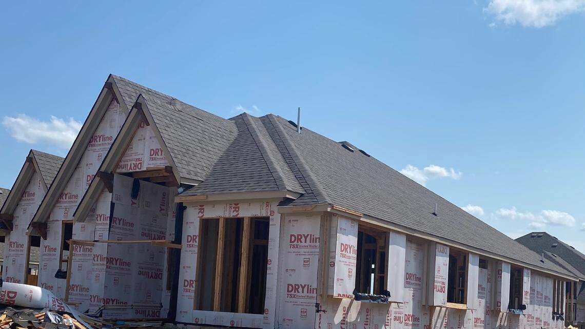 Winifred King, who is under contract to buy this home under construction in Mansfield, was elated to receive an email from builder Bloomfield Homes promising not to raise her price. Many other builders have shocked customers by raising prices by thousands of dollars, often just days or weeks before closing.