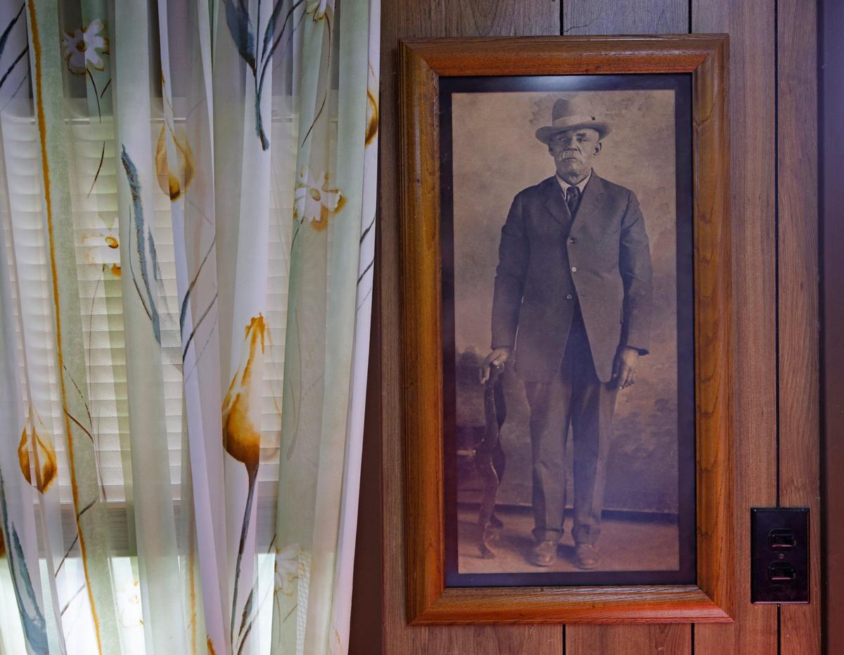 One of the original settlers, Major Cheney’s picture is hung in a bunk house in Fort Worth, Texas, Friday May 24, 2024. The Sanders have lived in The Garden of Eden, also known as a Freedman’s Community, almost since the neighborhoods beginnings.