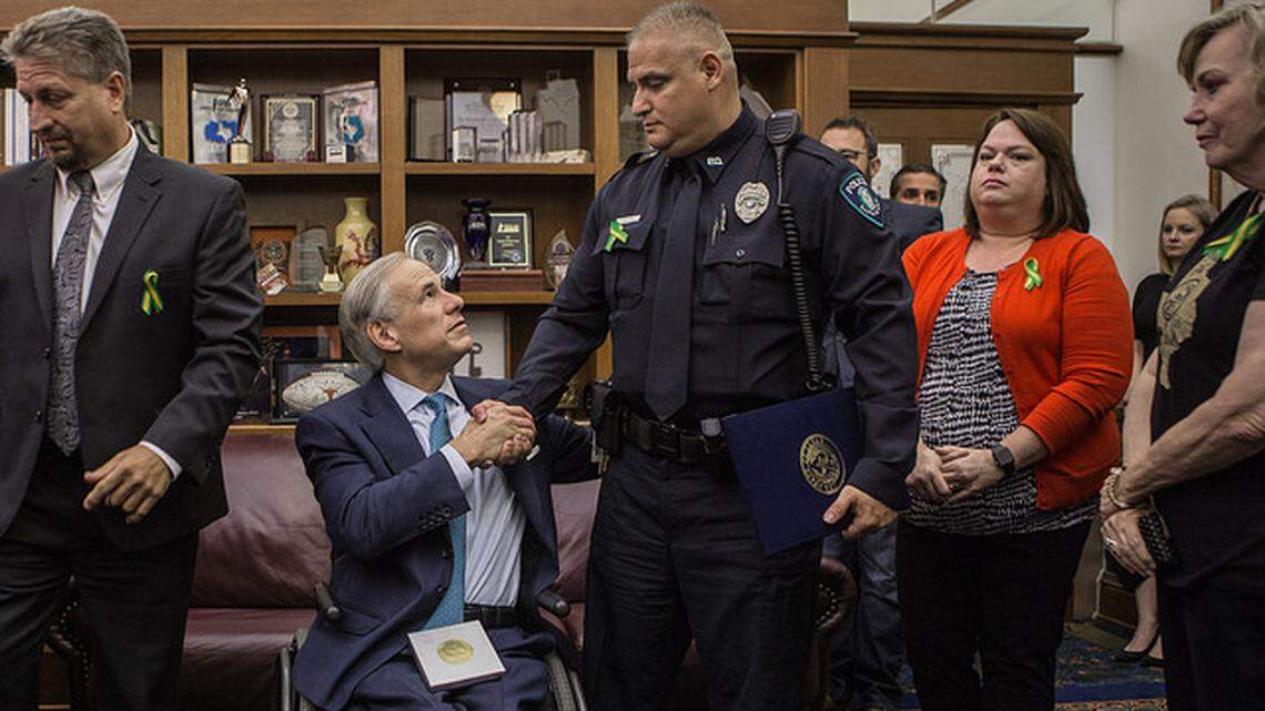 Gov. Greg Abbott meets with law enforcement, students and others during roundtable discussions aimed at improving school safety in Texas.