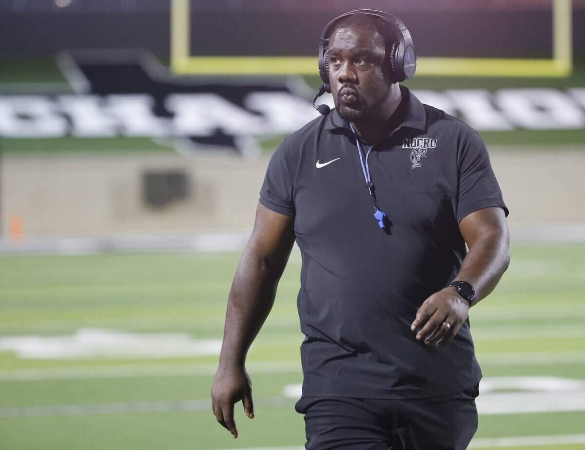 North Crowley head coach Ray Gates walks the sidelines during the first half of a UIL football game at Crowley ISD Stadium in Crowley, Texas, Thursday August, 28, 2025.