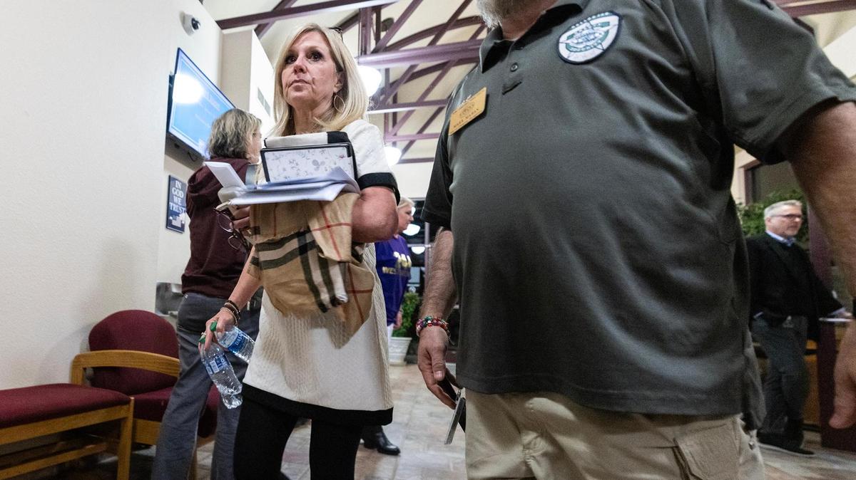 Keller ISD Superintendent Tracy Johnson exits the meeting room for a 10 minute break during a special meeting regarding the possible split of the Keller Independent School District at the Keller ISD Education Center in Keller on Thursday, Jan. 16, 2025.
