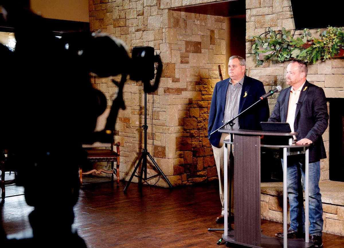 Brian Black president of Heritage HOA listens as Cary Moon, chairman Heritage Legal Task Force talks during a press conference on the status of the Keller ISD at the Heritage HOA Club House in Fort Worth, Texas, Tuesday, Mar. 03, 2025.