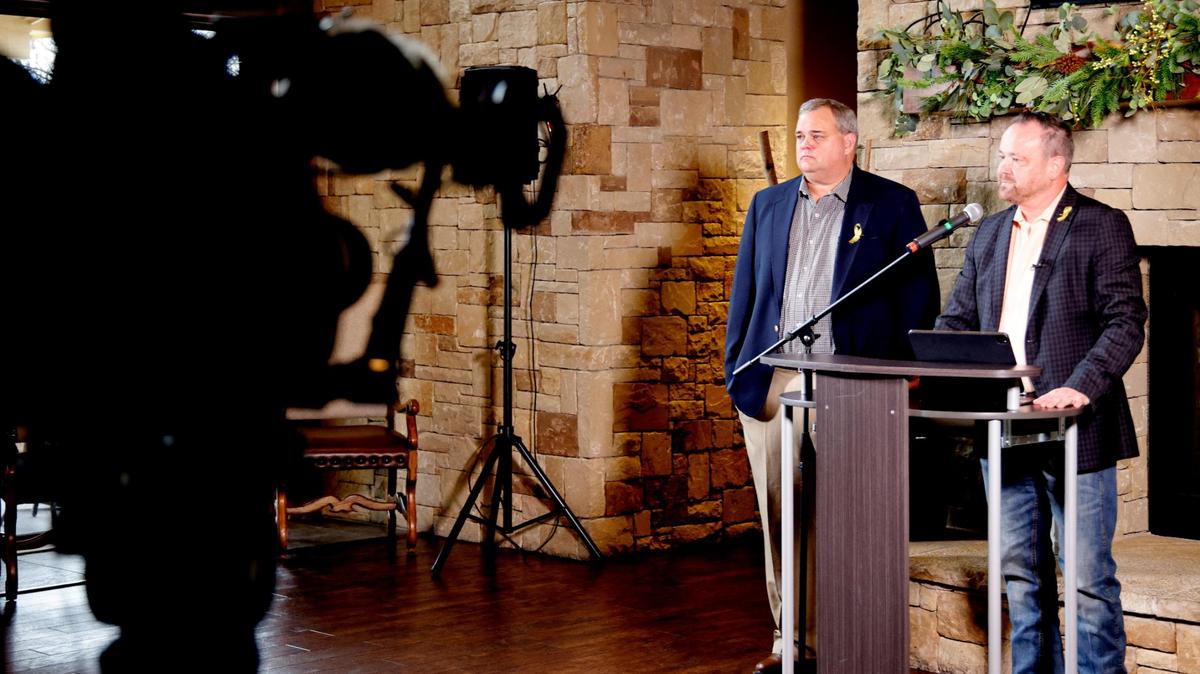 Brian Black president of Heritage HOA listens as Cary Moon, chairman Heritage Legal Task Force talks during a press conference on the status of the Keller ISD at the Heritage HOA Club House in Fort Worth in March. Black and Moon have filed a new lawsuit seeking the removal of some Keller ISD board members related to alleged  Open Meetings Act and board policy violations.