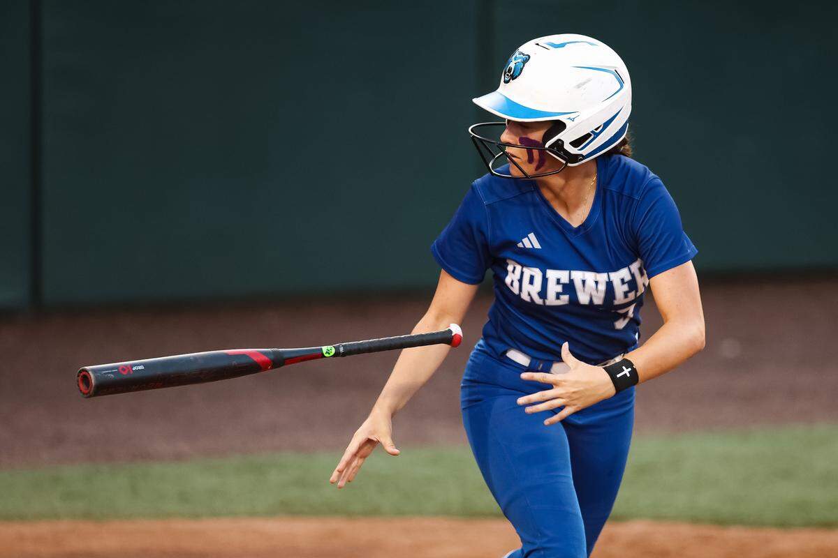 White Settlement Brewer second baseman Lilly Meller (3) tosses her bat against Montgomery Lake Creek in the UIL Class 5A Division II state softball championship game at Red & Charline McCombs field in Austin, Texas, on Friday, May 29, 2026.