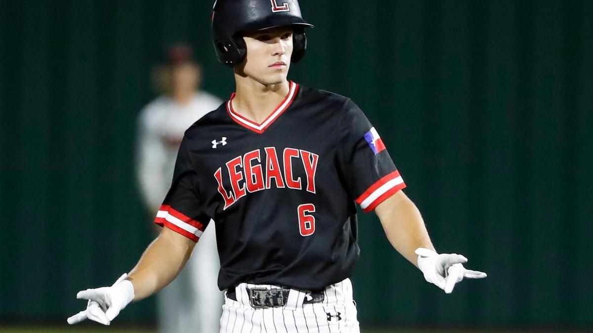 Legacy center fielder Dylan Schlaegel (6) signals after stealing second during game one of a 5A Region I final baseball game at Cleburne High School, Texas, Friday, June 03, 2022. Legacy defeated Aledo 8-5 in the first game of a best of three series. (Special to the Star-Telegram Bob Booth)