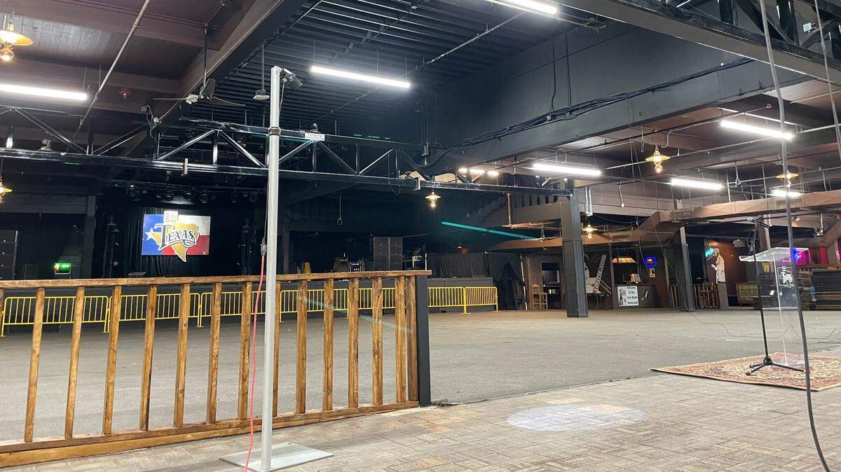 A light shines down on where one of the poles used to stand at Billy Bob’s Texas on February 29, 2024.