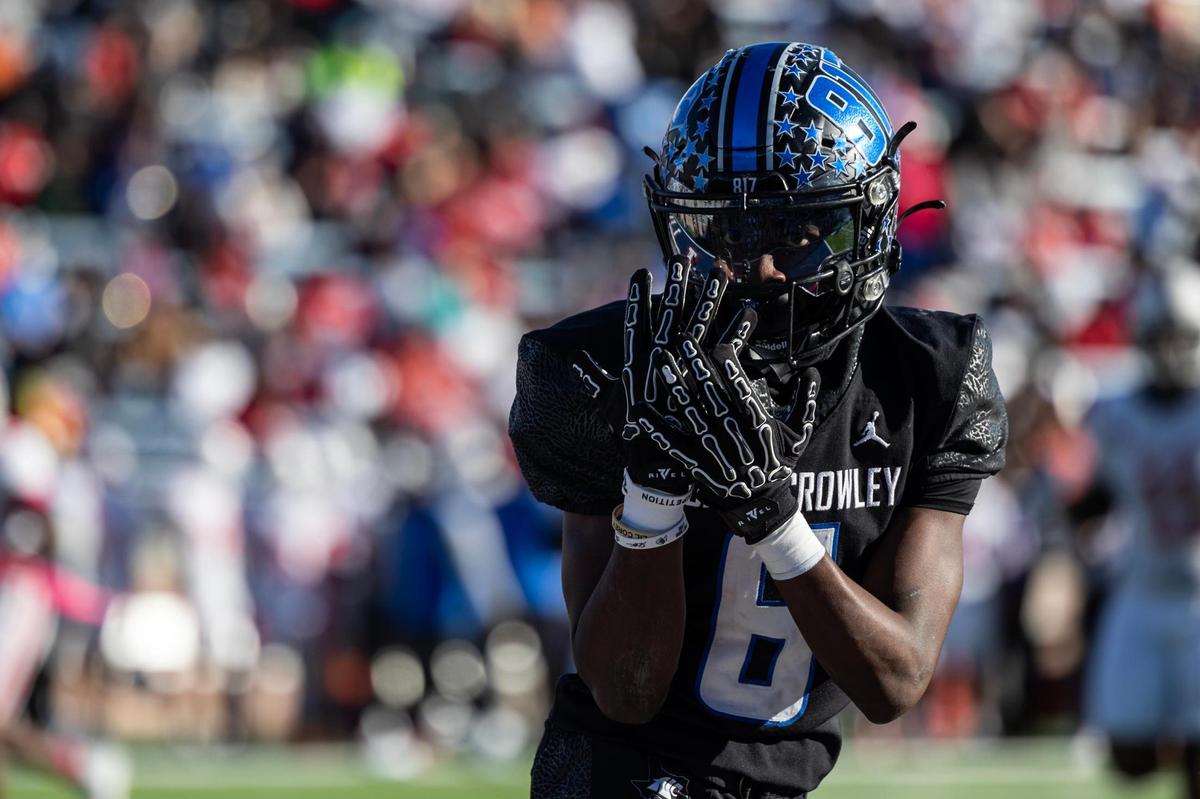 North Crowley wide receiver Quentin Gibson (6) celebrates after scoring a touchdown in the first half of the Class 6A Division I state semifinal game at Eagle Stadium in Allen on Saturday, Dec. 14, 2024.