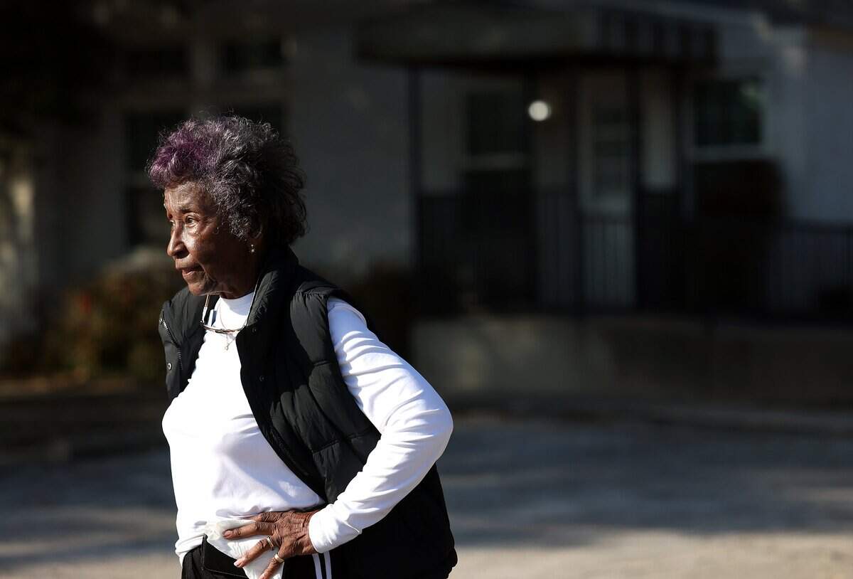 Linnie McAdams stands next to the Denton Woman's Club Building on Feb. 12, 2026, at Quakertown Park in downtown Denton. McAdams wants more knowledge and accountability given to the history of Quakertown and the Black residents that were forced to relocate in 1921.