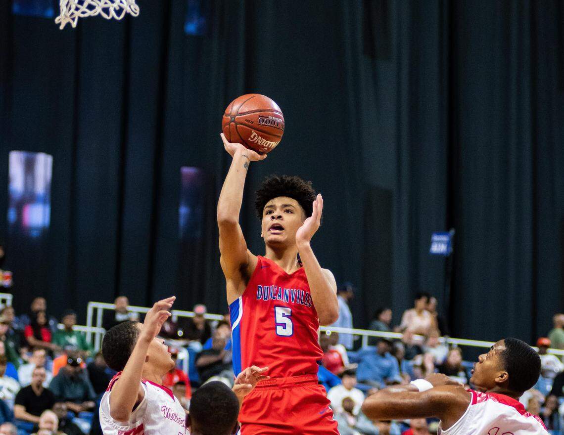 Duncanville’s Micah Peavy goes in for two vs. North Shore at the Alamodome, Friday March 8, 2019.
