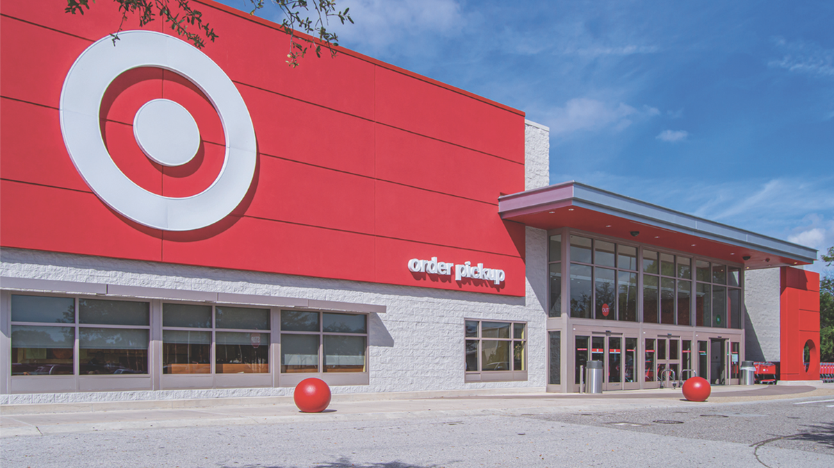 A renovated Target in St. Petersburg, Florida features a modernized exterior. A large, bright red wall features nothing but a simple white target logo and letters.