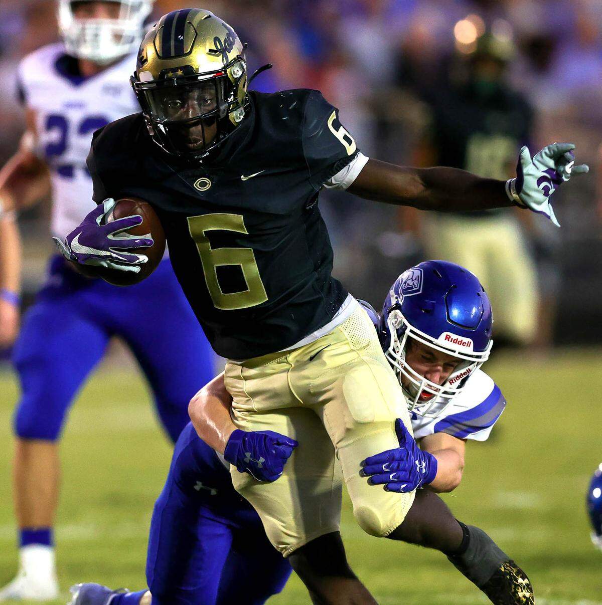 Cleburne running back Jacarrean Gray (6) finds a nice hole to run against Weatherford during the first half, Friday night, September 10, 2021 played at Yellow Jacket Stadium in Cleburne, TX. (Steve Nurenberg Special to the Star-Telegram)