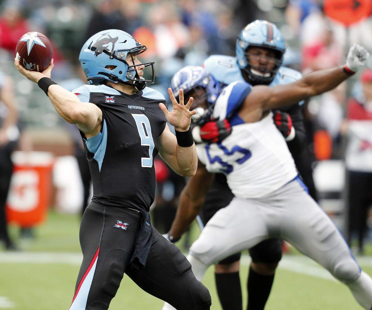 Dallas Renegades quarterback Philip Nelson throws a pass during a 2020 XFL game.
