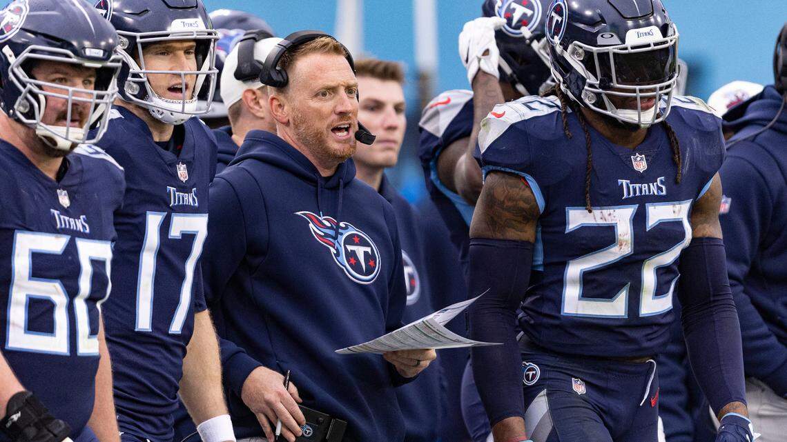 Tennessee Titans offensive coordinator Todd Downing stands with quarterback Ryan Tannehill (17), Ben Jones (60), and running back Derrick Henry (22). Tannehill and Jones are out for the season with injuries; Henry may skip the game to stay healthy for season finale against Jacksonville.