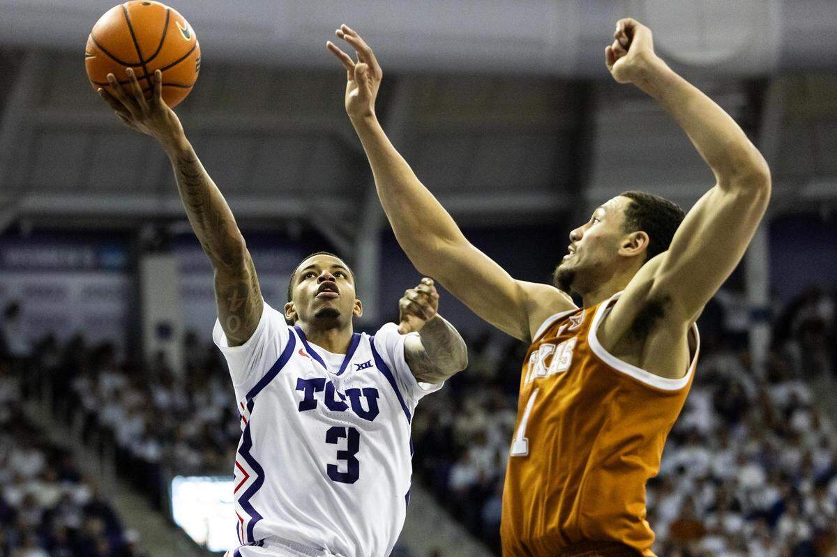 TCU guard Avery Anderson (3) goes up for a layup in the first half against the Texas Longhorns at Schollmaier Arena on Saturday.