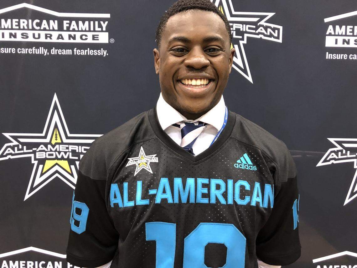 Nolan Catholic senior NaNa Osafo-Mensah receives his All-American jersey, Thursday Nov. 15, 2018