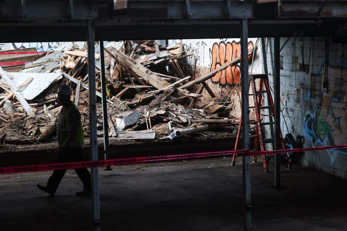 The interior of the Fred Rouse Center for Arts and Community Healing on Tuesday, Aug. 26, 2025. During construction efforts will be taken to recycle elements of the building being demolished, like the wood pile seen.