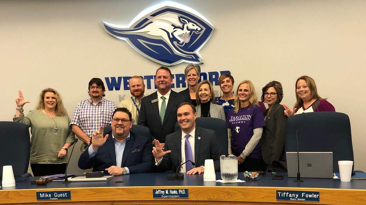 Weatherford ISD and Tarleton State University officials celebrate the recent approval of a memorandum of understanding by the WISD Board of Trustees for the school district to participate in the university’s Distinguished High School Partnership Program.