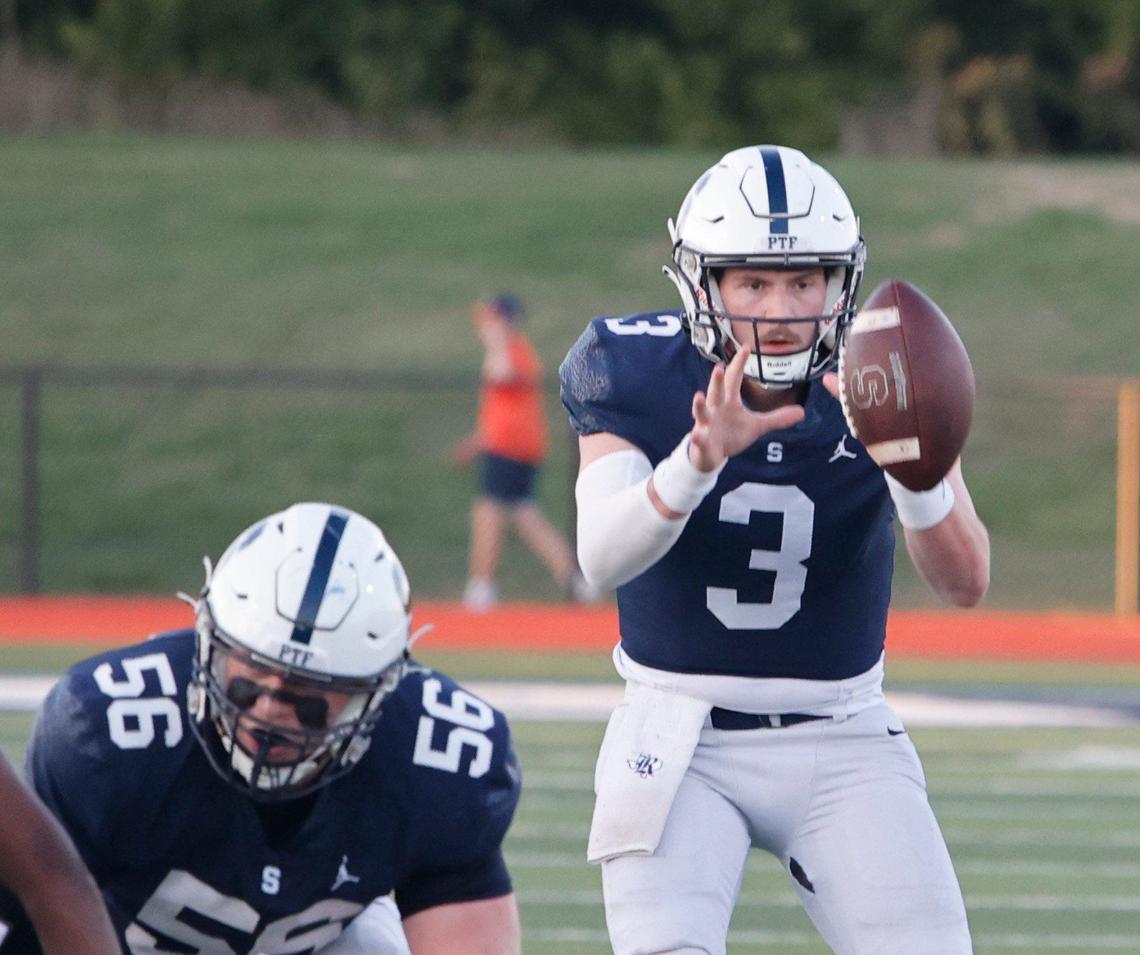 All Saints quarterback Gavin Parkhurst (3) takes the snap during a TAPPS football game at All Saints High School’s McNair Stadium in Fort Worth Thursday, Sept. 12, 2024.
