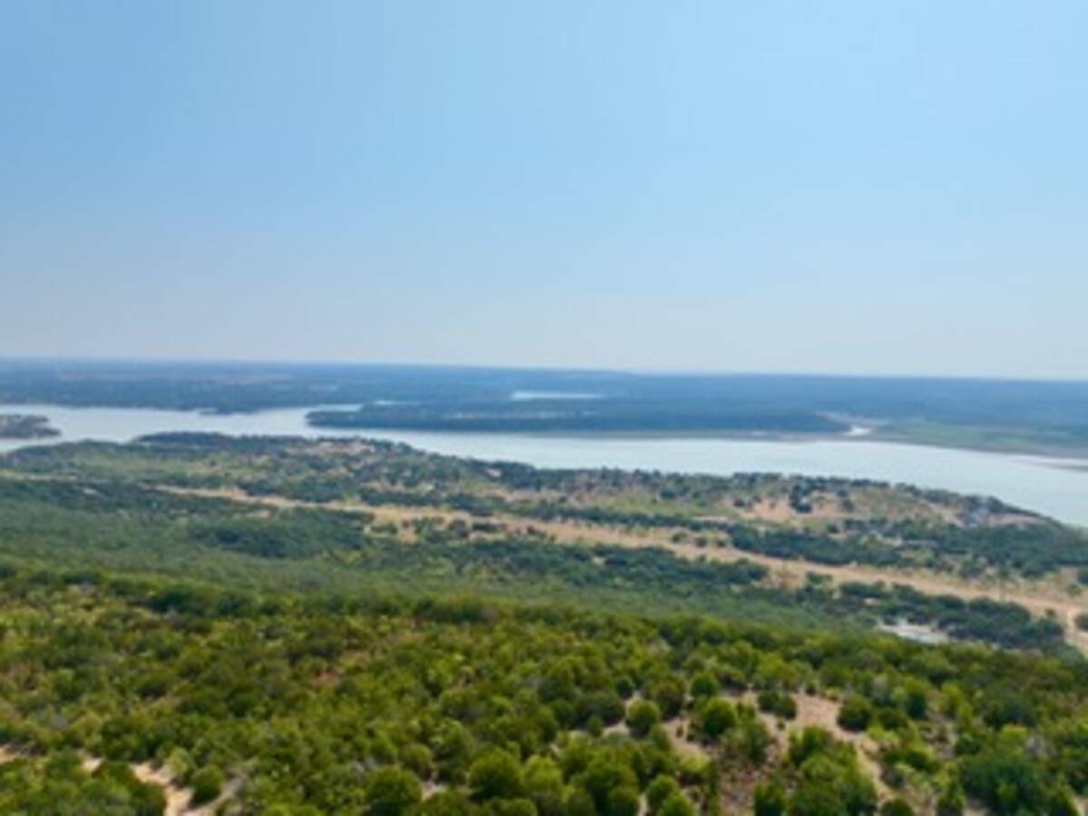 The land provides sweeping views of Palo Pinto Lake. 