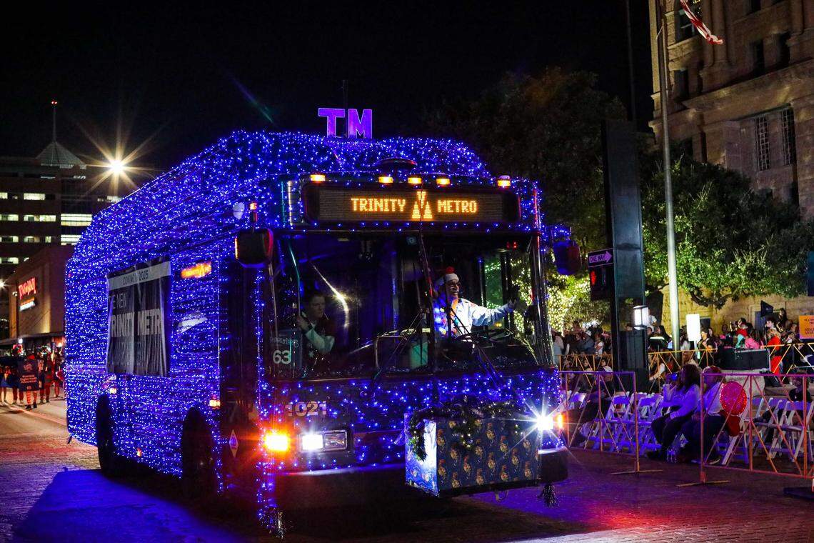 A Trinity Metro bus gets decked out for the GM Financial Parade of Lights in downtown Fort Worth.