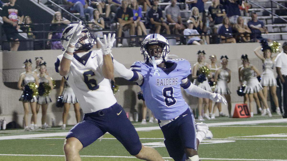 Keller’s Bodie Davis comes down with a touchdown pass against Keller during their game at Pennington Field on Friday, Sep. 19, 2025 