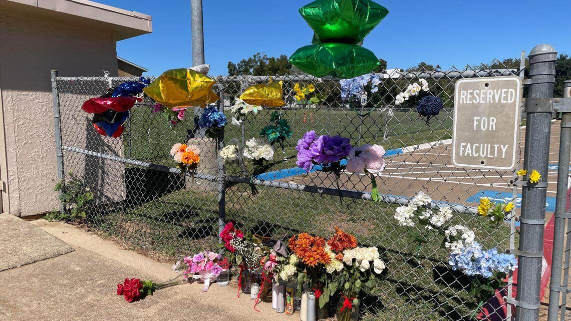 A memorial outside of David K. Sellars Elementary School in Forest Hill, Texas honors Yolanda Gibbs, who was fatally shot in the school’s back parking lot on Wednesday, Oct. 11, 2023.