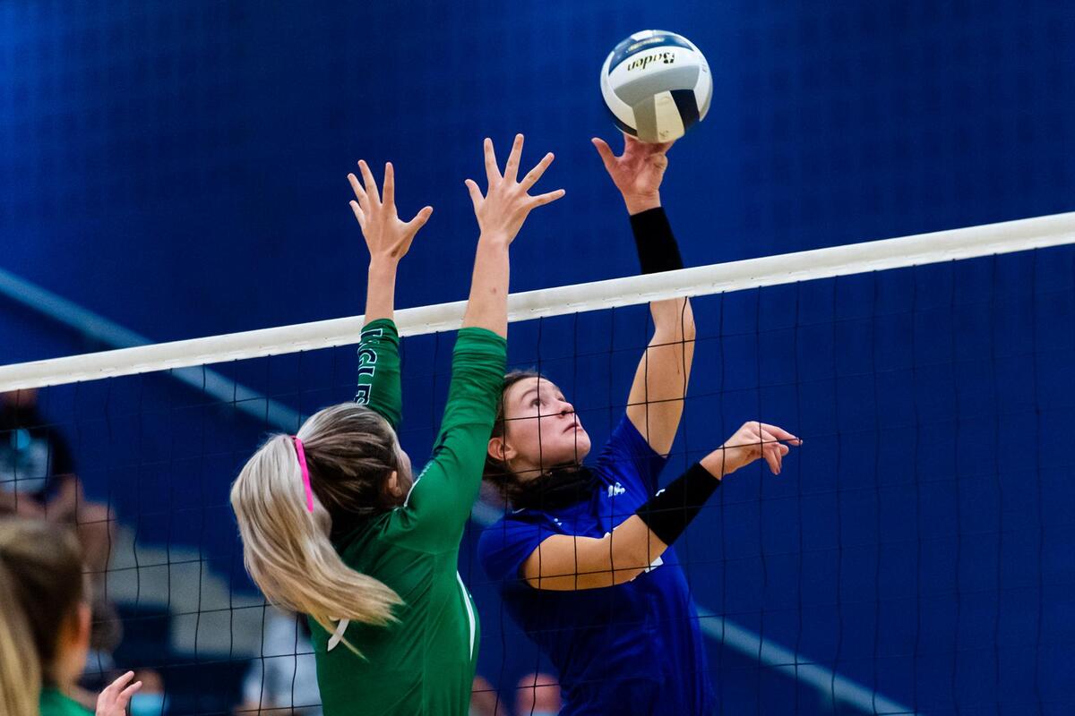 Payton Chamberlain tips the ball over the blocker during set 3 of a district game between Byron Nelson and Eaton at V.R. Eaton High School on October 20th, 2020. (Photo by Matt Smith. Special to the Star-Telegram).