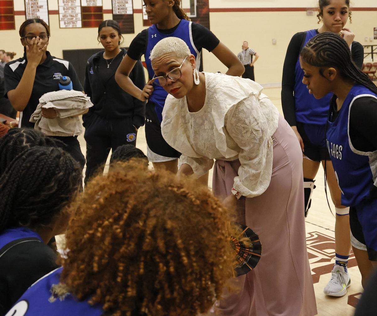 Mansfield Summit head coach Amy Gillum talks to her team during a timeout against Argyle in the first half of a UIL Class 5A DII girls playoff basketball game at Saginaw High School in Saginaw, Texas, Thursday Feb. 19, 2026.