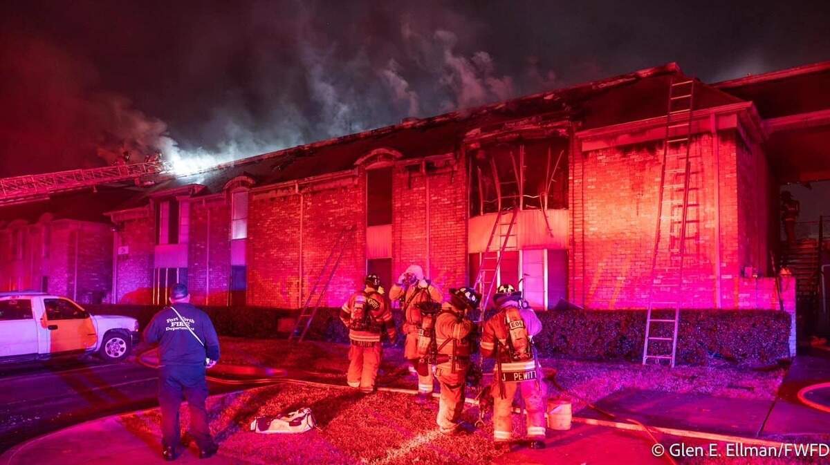 Fort Worth firefighters battled a blaze at an apartment complex the night of Friday, Feb. 28, that left around 20 people displaced, officials say. The cause of the fire is under investigation, but a man has been arrested and faces an arson charge.