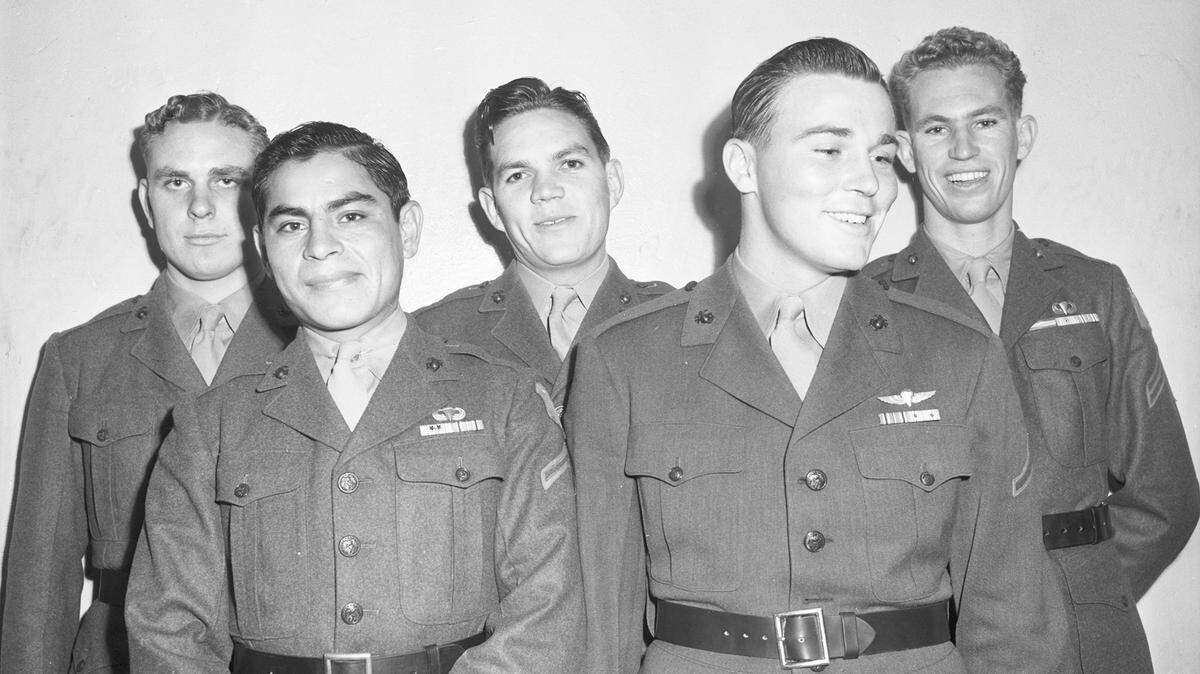 Gonzalo (Charlie) Torres, second from left, and his brothers receive little to no mention in the book and movie about the Fort Worth Masonic Home’s Mighty Mites football team. This photo from 1944 shows members of the team who joined the Marines. From left Billy J. Cagle, Torres, Bill Brigman, Gordy Brown and Jim Jordan.