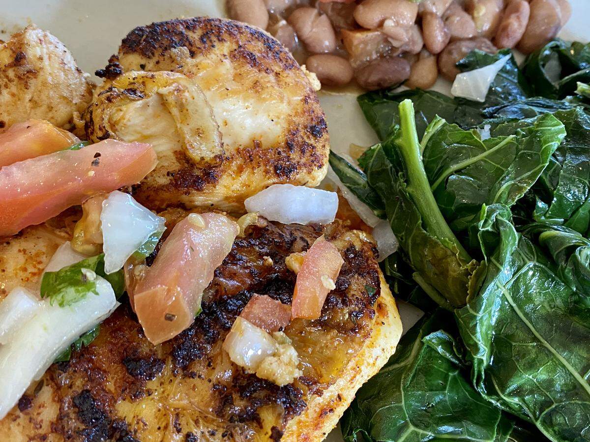 A grilled chicken special with pico, collards and pintos at Luby’s.