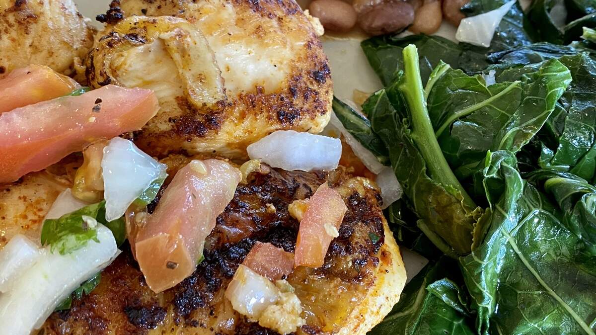 A grilled chicken special with pico, collards and pintos at Luby’s.