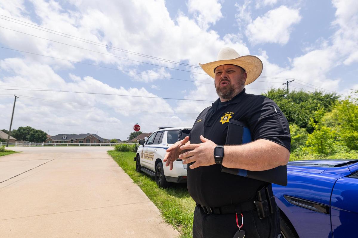 Jeremiah Allen, a crash investigator at the Tarrant County Sheriff’s Office, speaks about the fatal crashes that have occurred at the intersection of Highway 1187 and Gipson Manor Court in Crowley in June. Allen believes one of the most effective ways to improve road safety is among the most straightforward: putting more cops on the street.