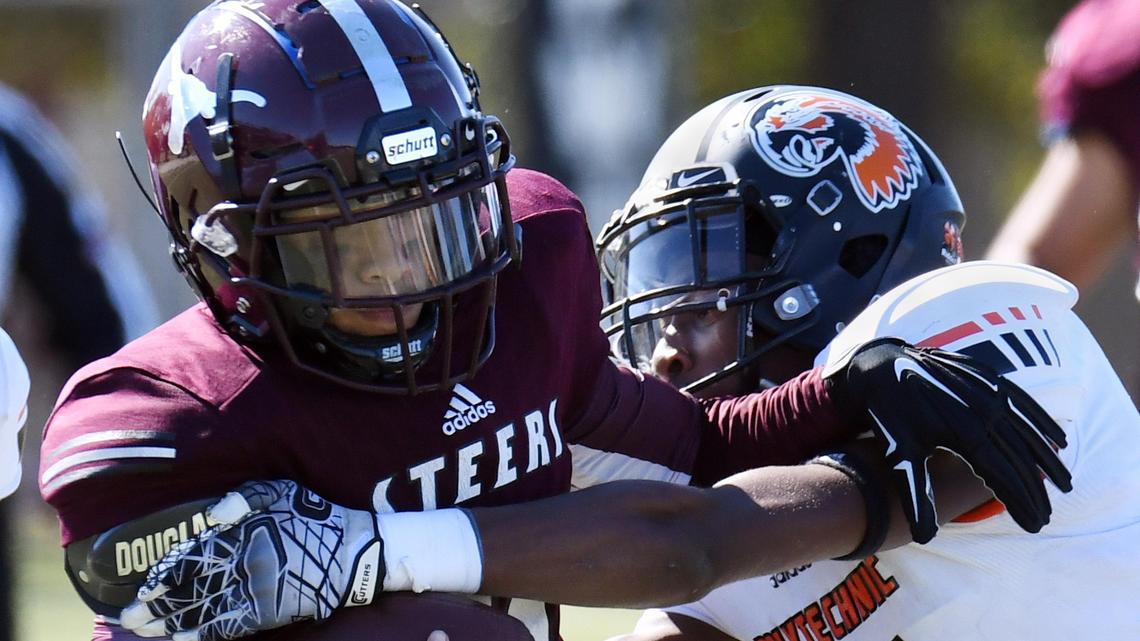North Side quarterback Isaak Rosales (left) and the Steers improved to 5-0 for the first time since 1946.