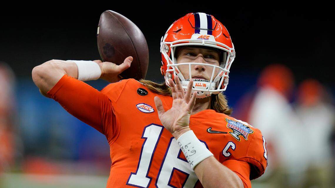 Clemson quarterback Trevor Lawrence warms up before the Sugar Bowl NCAA college football game against Ohio State Friday, Jan. 1, 2021, in New Orleans. (AP Photo/Gerald Herbert)
