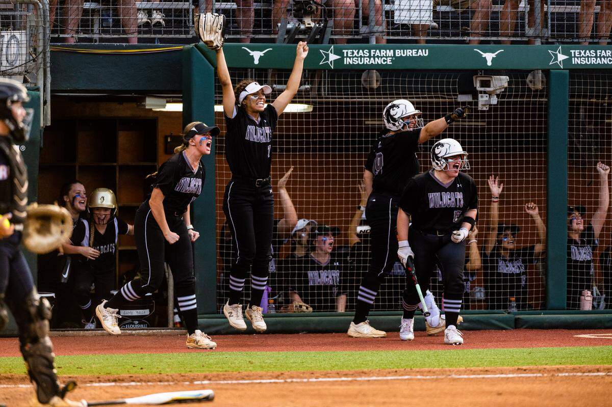 The Denton Guyer bench celebrates as Erin Peterson scores the first run of the game against Cypress Bridgeland on a single by Lauren Jones in the second inning of a Class 6A state semifinal on Friday, June 2, 2023 at McCombs Field in Austin, TX.