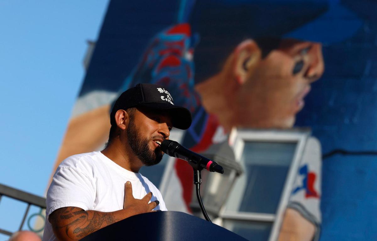 Fort Worth artist Juan Velasquez speaks during an event to unveil of a mural he created to celebrate MLB All-Star Week on Wednesday, July 10, 2024, in Fort Worth. “I grew not too far away from here,” said Velasquez. “Mainly speaking to the youth, you have to dream big.”