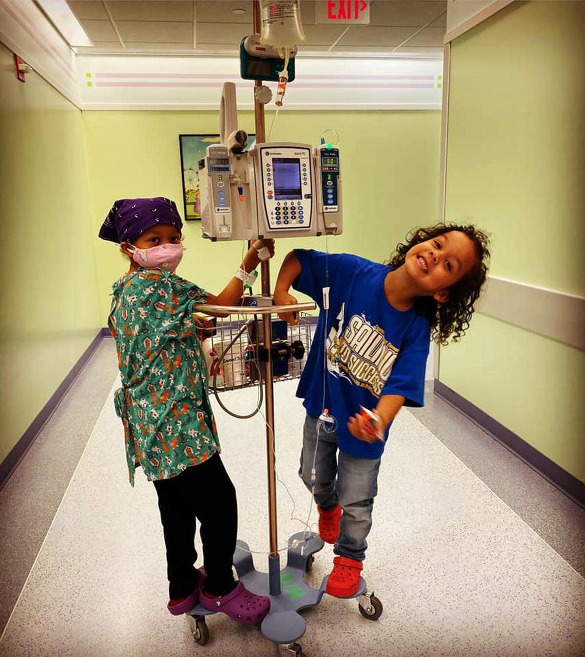 Adriana Nixon (left), 6, and her younger brother, LeeAndrew Nixon Jr. (right), 5, have a moment of play in the hospital. She has to be admitted during times when she’s receiving chemotherapy.