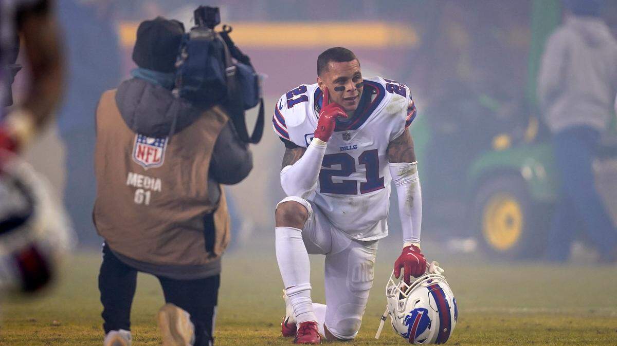 Buffalo Bills free safety Jordan Poyer kneels on the field after losing 42-36 to the Kansas City Chiefs in overtime in the AFC divisional round playoff game in January.