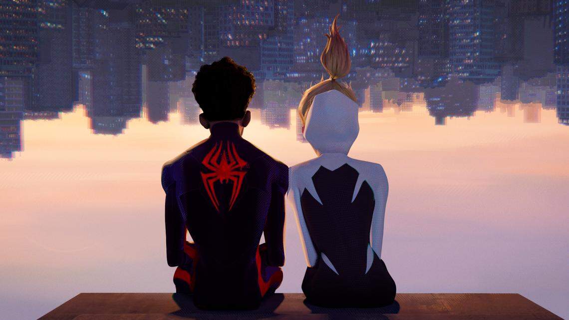 This image released by Sony Pictures Animation shows Miles Morales as Spider-Man, voiced by Shameik Moore, left, and and Spider-Gwen, voiced by Hailee Steinfeld, in a scene from Columbia Pictures and Sony Pictures Animation’s “Spider-Man: Across the Spider-Verse.” (Sony Pictures Animation via AP)